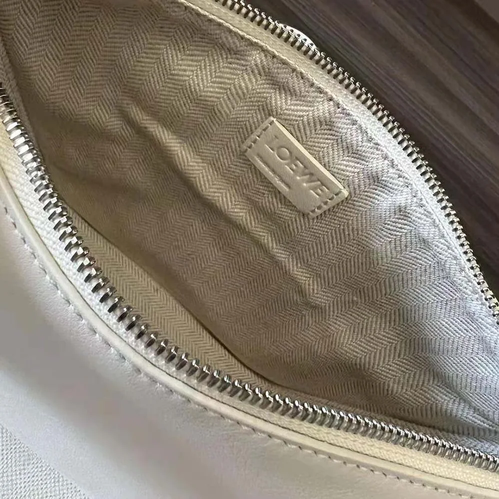 Loewe Mini Hammock Hobo Bag in Classic Calfskin for Women in White Loewe Mini Hammock Hobo Bag in Classic Calfskin for Women in White