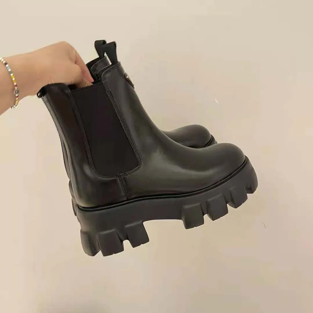 Prada Monolith Brushed Leather Booties for Women in Black