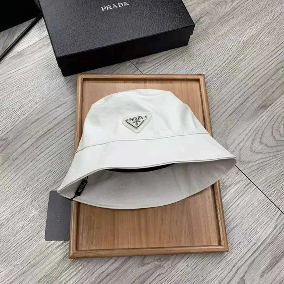 Prada Ostrich Leather Bucket Hat for Women in White Prada Ostrich Leather Bucket Hat for Women in White