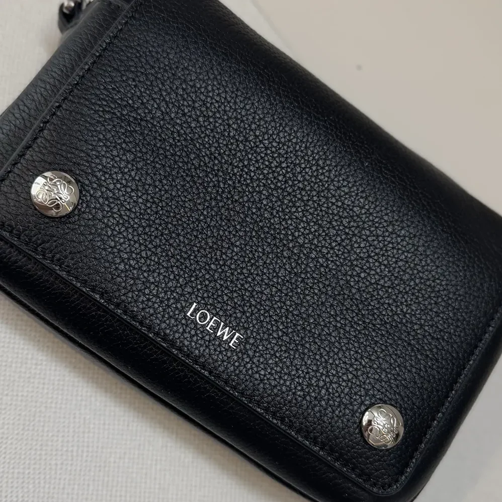 Loewe Small Pebble Messenger Bag in Supple Grained Calfskin for Unisex in Black