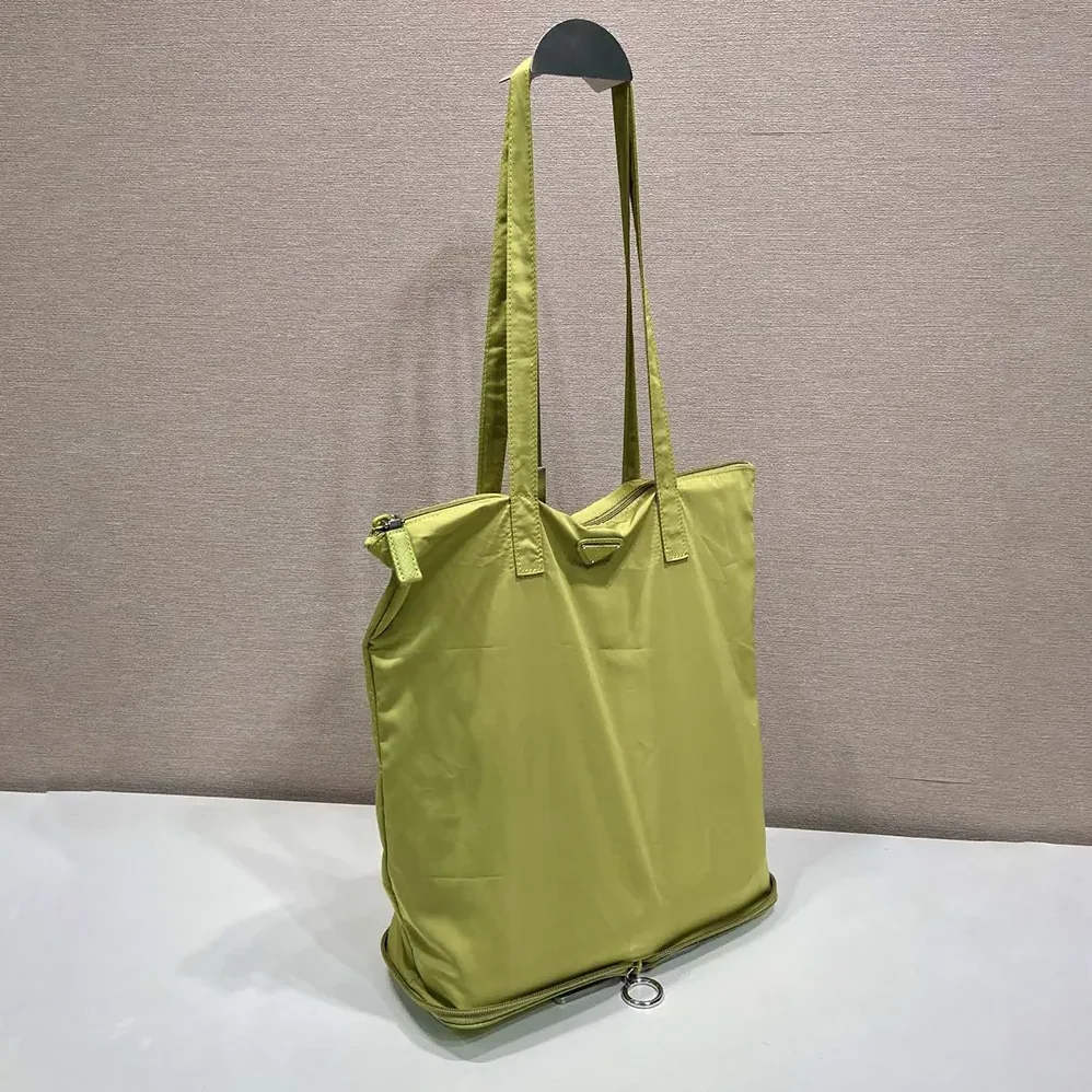 Prada Saffiano Leather Pendant With Re-Nylon Tote Bag for Women in Green Prada Saffiano Leather Pendant With Re-Nylon Tote Bag for Women in Green