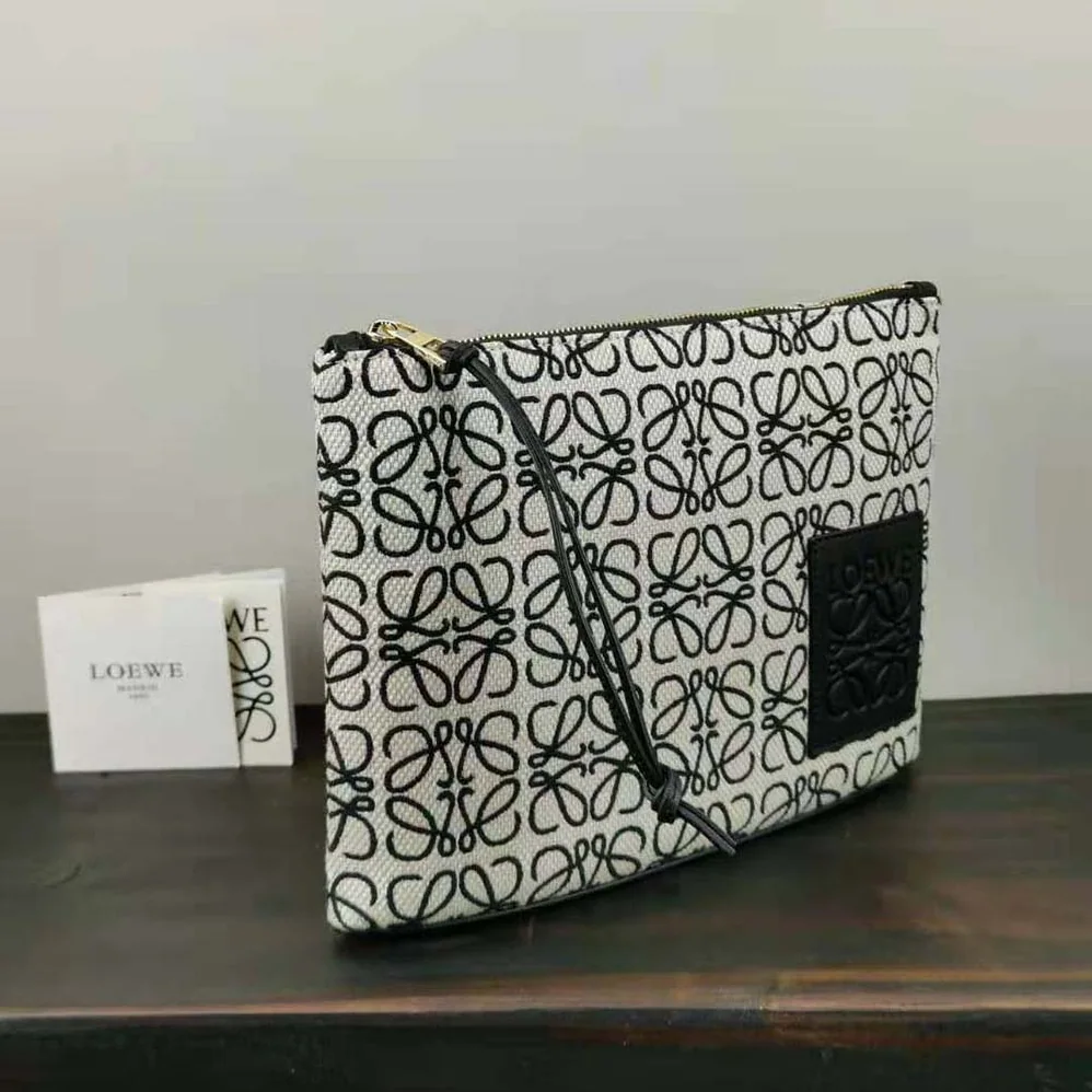 Loewe Oblong Anagram Pouch in Jacquard and Calfskin for Women in Black Loewe Oblong Anagram Pouch in Jacquard and Calfskin for Women in Black