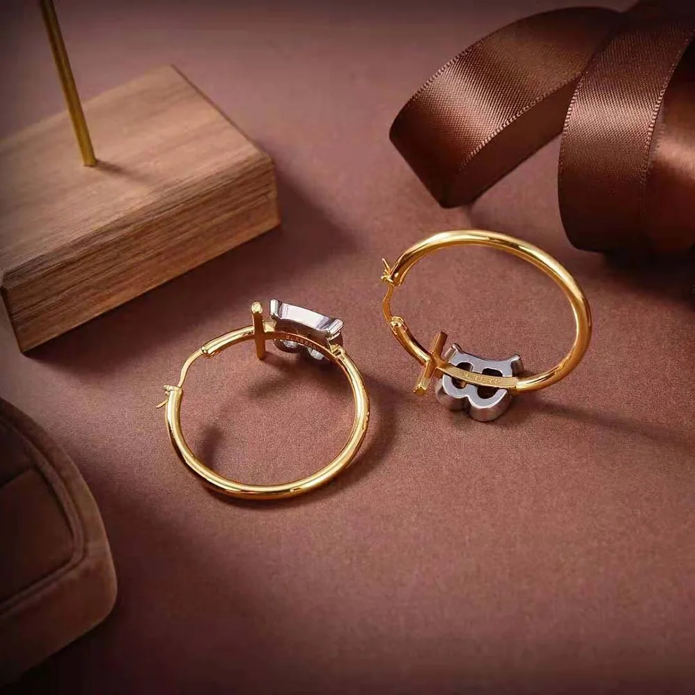 Burberry Gold and Palladium for Women in plated Monogram Motif Earrings Burberry Gold and Palladium for Women in plated Monogram Motif Earrings