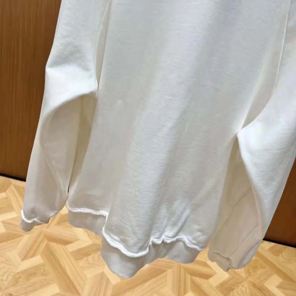 Miu Miu Cotton Polo Sweatshirt with Embroidered Logo for Women in White Miu Miu Cotton Polo Sweatshirt with Embroidered Logo for Women in White