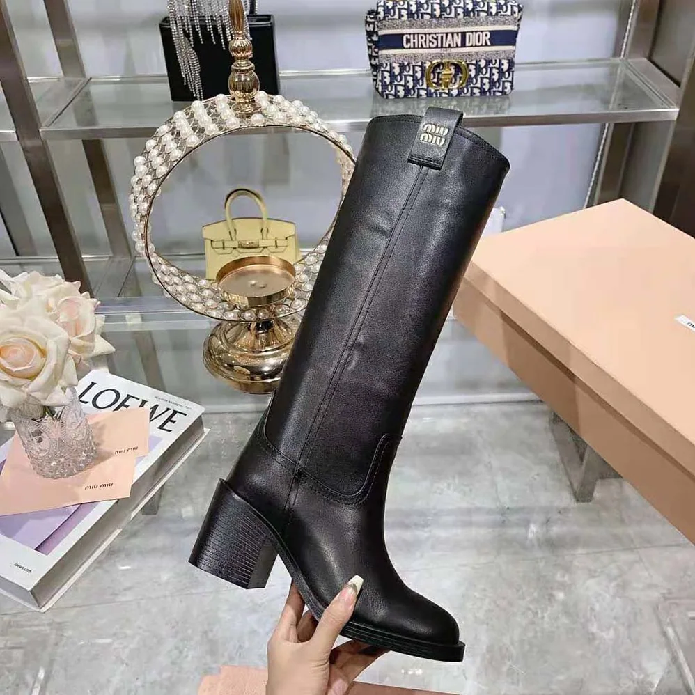Miu Miu Leather Booties with Screen-printed Logo for Women in Black