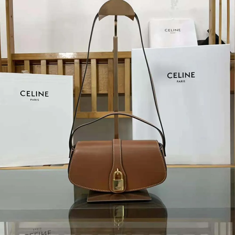 Celine Clutch on Strap in Smooth Calfskin for Women in Brown