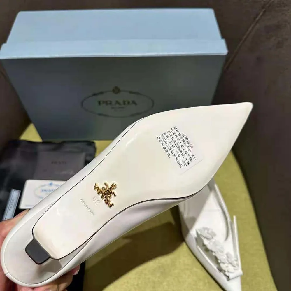 Prada Brushed Leather Pumps with Floral Appliqués for Women in White
