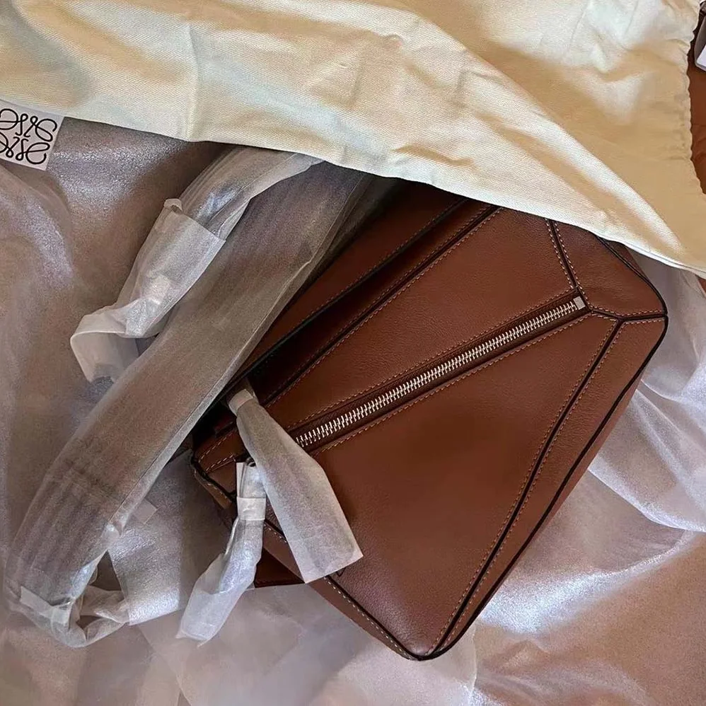 Loewe Small Puzzle Bumbag in Classic Calfskin for Unisex in Brown