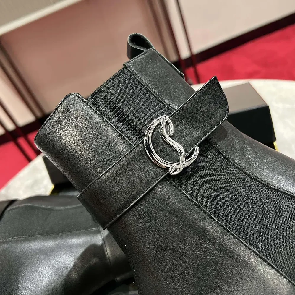 Christian Louboutin CL Chelsea Booty Lug Low Boots Calf Leather for Women in Black