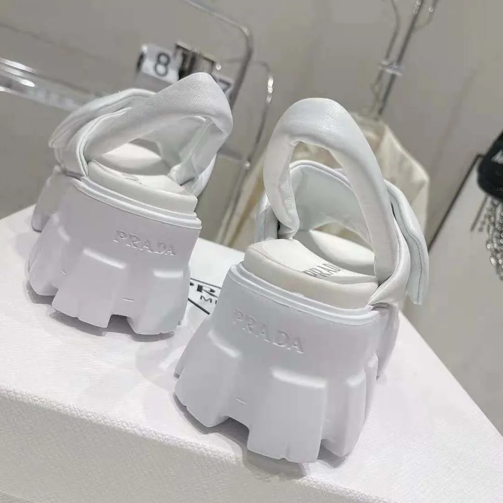 Prada Monolith Padded Nappa Leather Sandals for Women in White Prada Monolith Padded Nappa Leather Sandals for Women in White