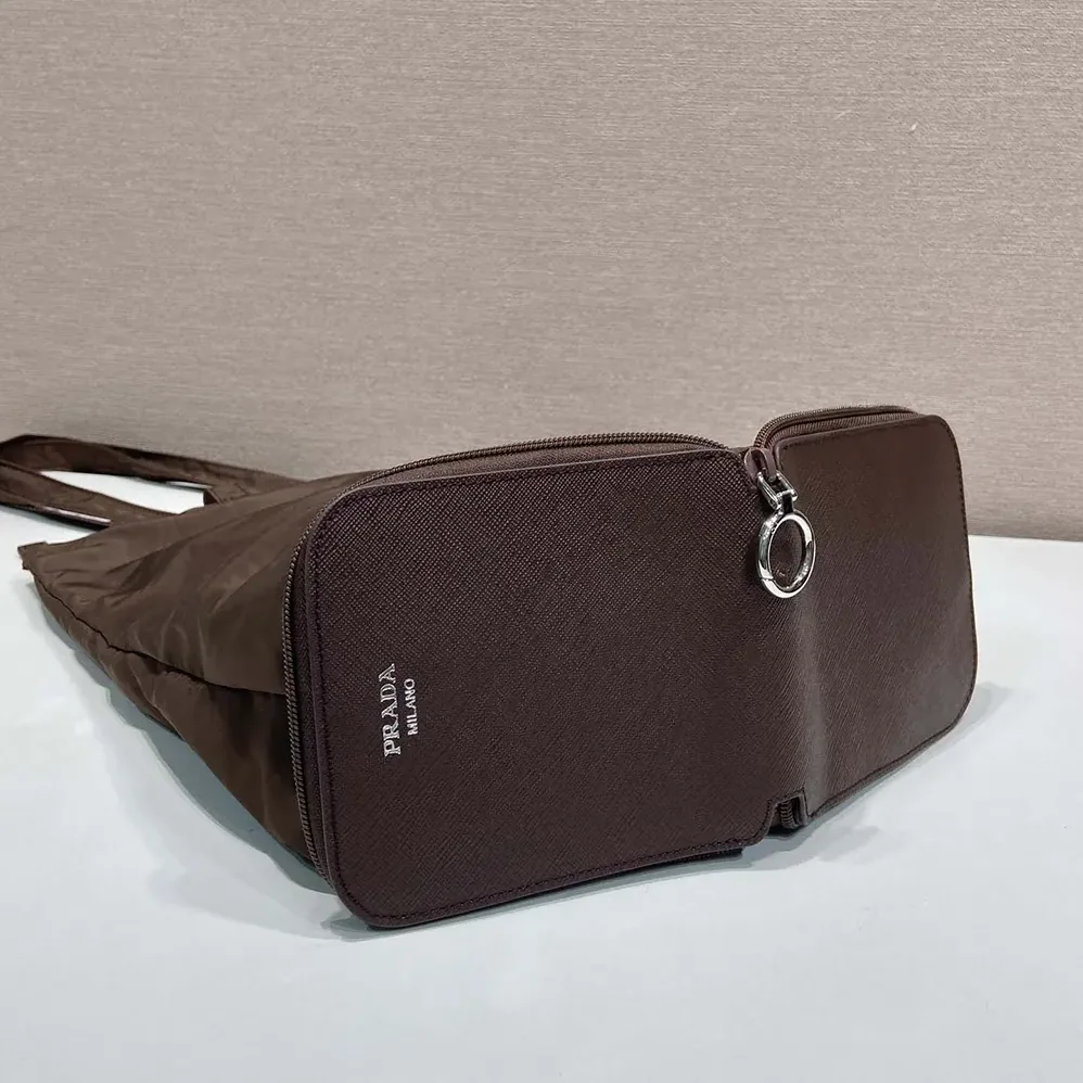 Prada Saffiano Leather Pendant With Re-Nylon Tote Bag for Women in Sienna Prada Saffiano Leather Pendant With Re-Nylon Tote Bag for Women in Sienna