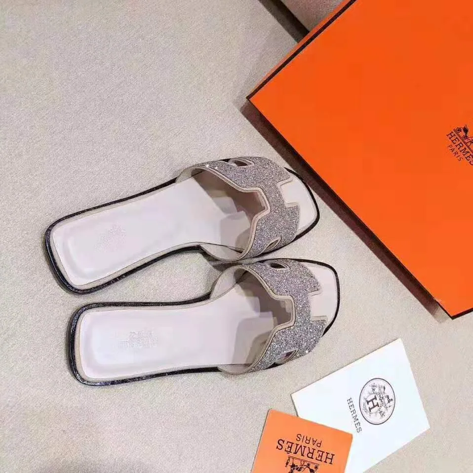 Hermes Oran Sandal Hermes Sandal in Metallic Nappa Leather and Cristal Powder for Women in Sandy