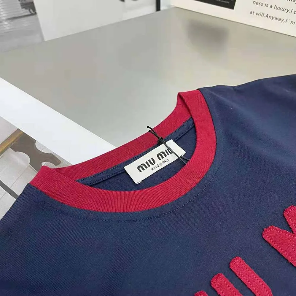 Miu Miu Jersey T-shirt with Embroidered Logo for Women in Navy Miu Miu Jersey T-shirt with Embroidered Logo for Women in Navy