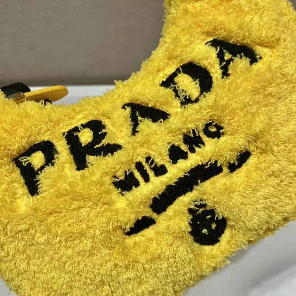 Prada Re-Edition 2000 Terry Mini-Bag for Women in Yellow Prada Re-Edition 2000 Terry Mini-Bag for Women in Yellow