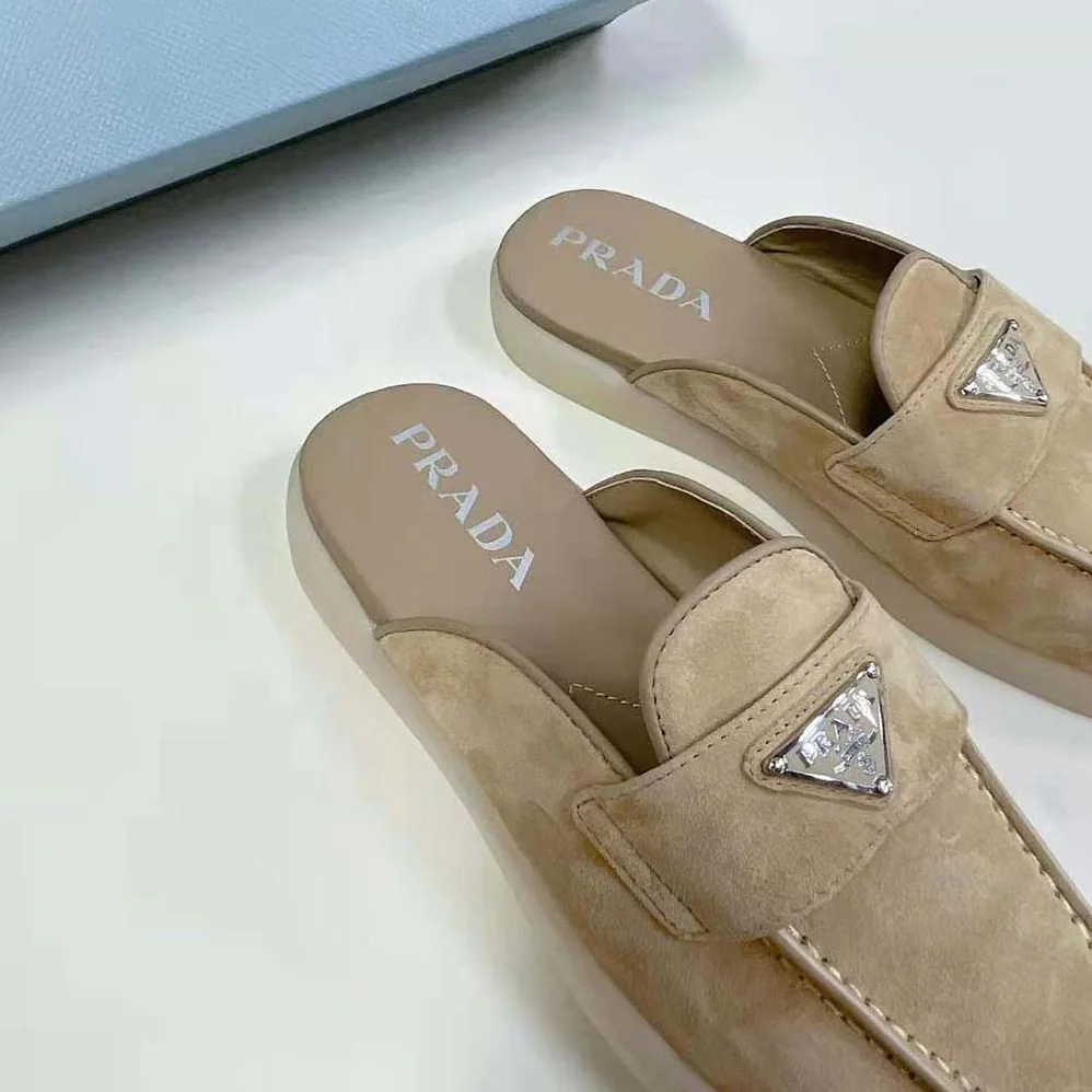 Prada Suede Leather Sabots with Enameled Metal Triangle Logo for Unisex in Brown