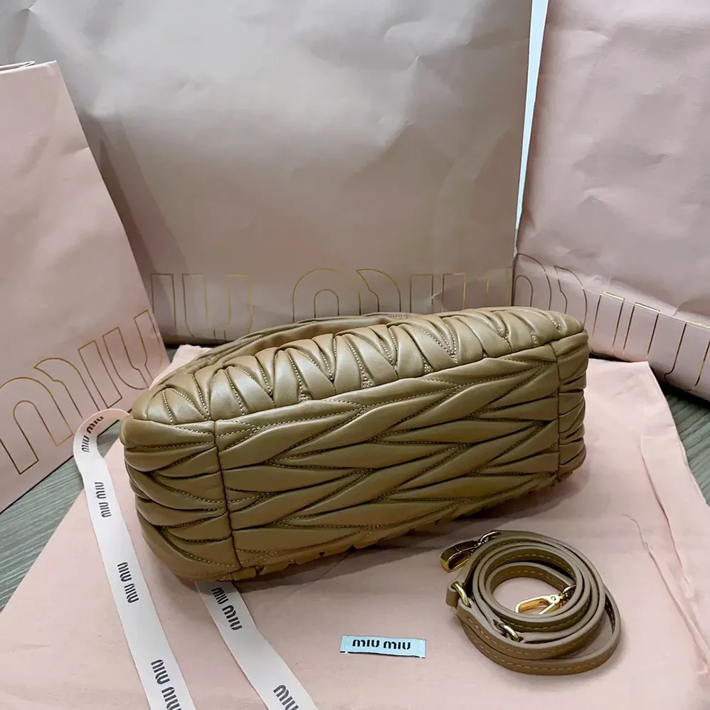 Miu Miu Wander Matelassé Nappa Leather Hobo Bag for Women in Caramel Miu Miu Wander Matelassé Nappa Leather Hobo Bag for Women in Caramel