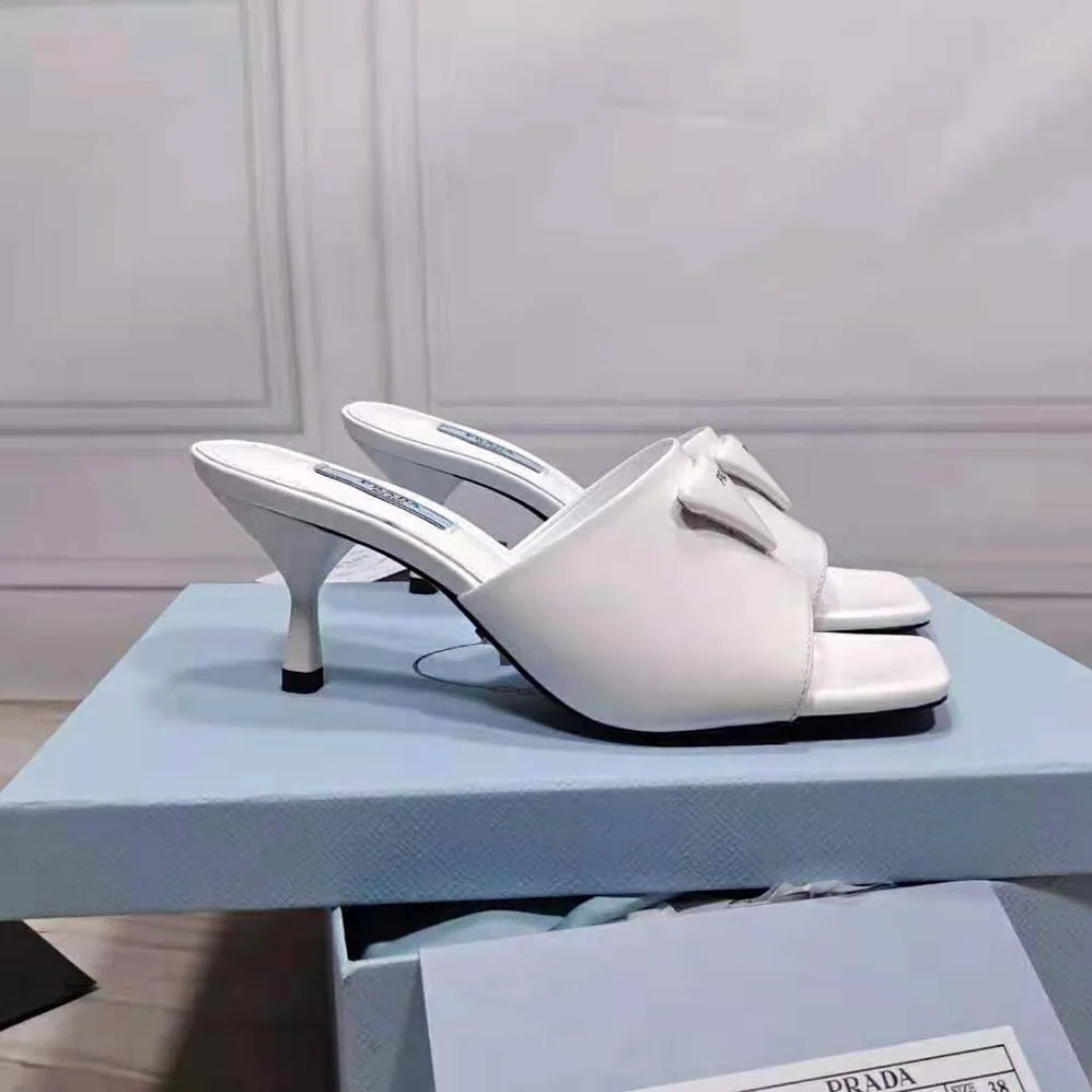 Prada Brushed Leather Mid-heeled Slides in 65mm Heel for Women in White Prada Brushed Leather Mid-heeled Slides in 65mm Heel for Women in White