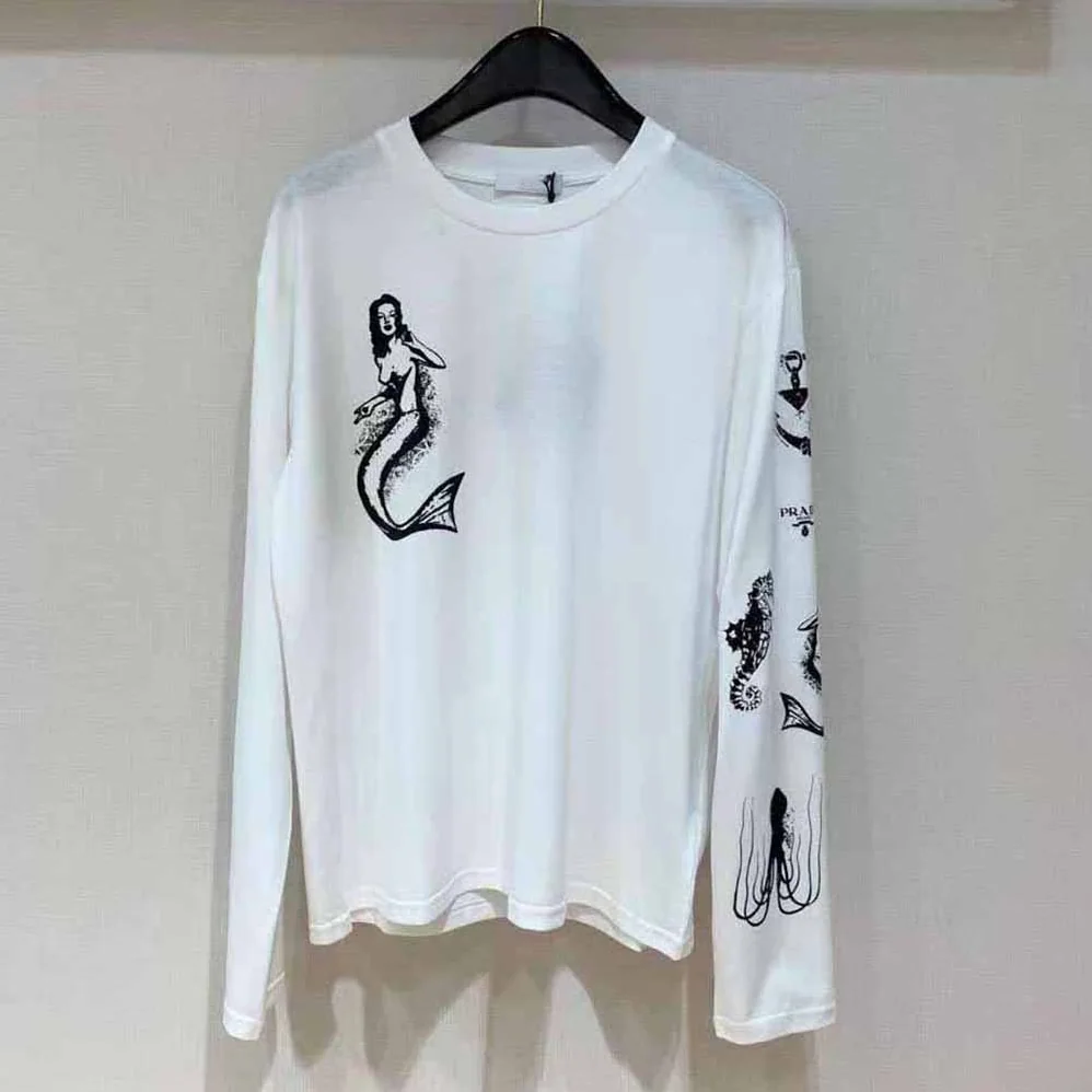 Prada Printed Cotton T-shirt with the Lettering Logo for Women in White Prada Printed Cotton T-shirt with the Lettering Logo for Women in White
