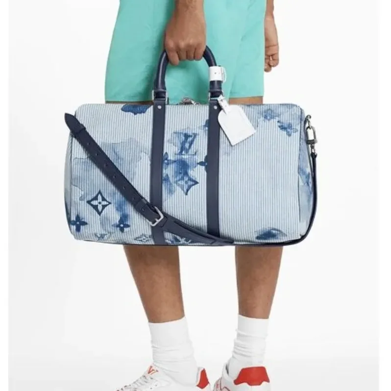 Louis Vuitton Keepall Bandouliere 50 Travel Bag in Blue Silver Hardware Louis Vuitton Keepall Bandouliere 50 Travel Bag in Blue Silver Hardware
