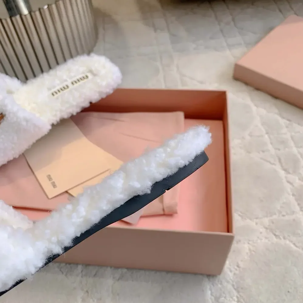 Miu Miu Shearling Slides with Leather Logo for Women