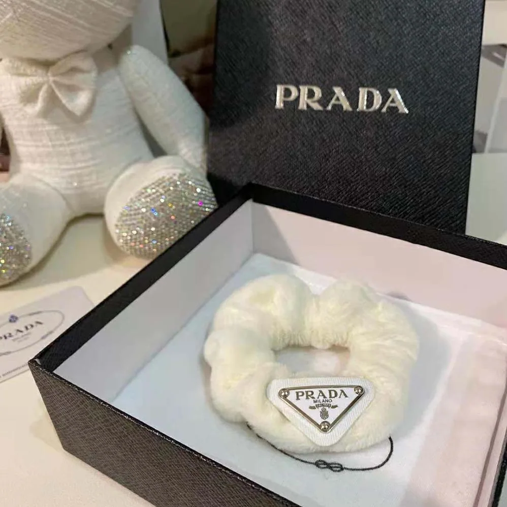 Prada Terry Scrunchie with A Retro Mood is Made of Soft Terry Cloth for Women in White Prada Terry Scrunchie with A Retro Mood is Made of Soft Terry Cloth for Women in White