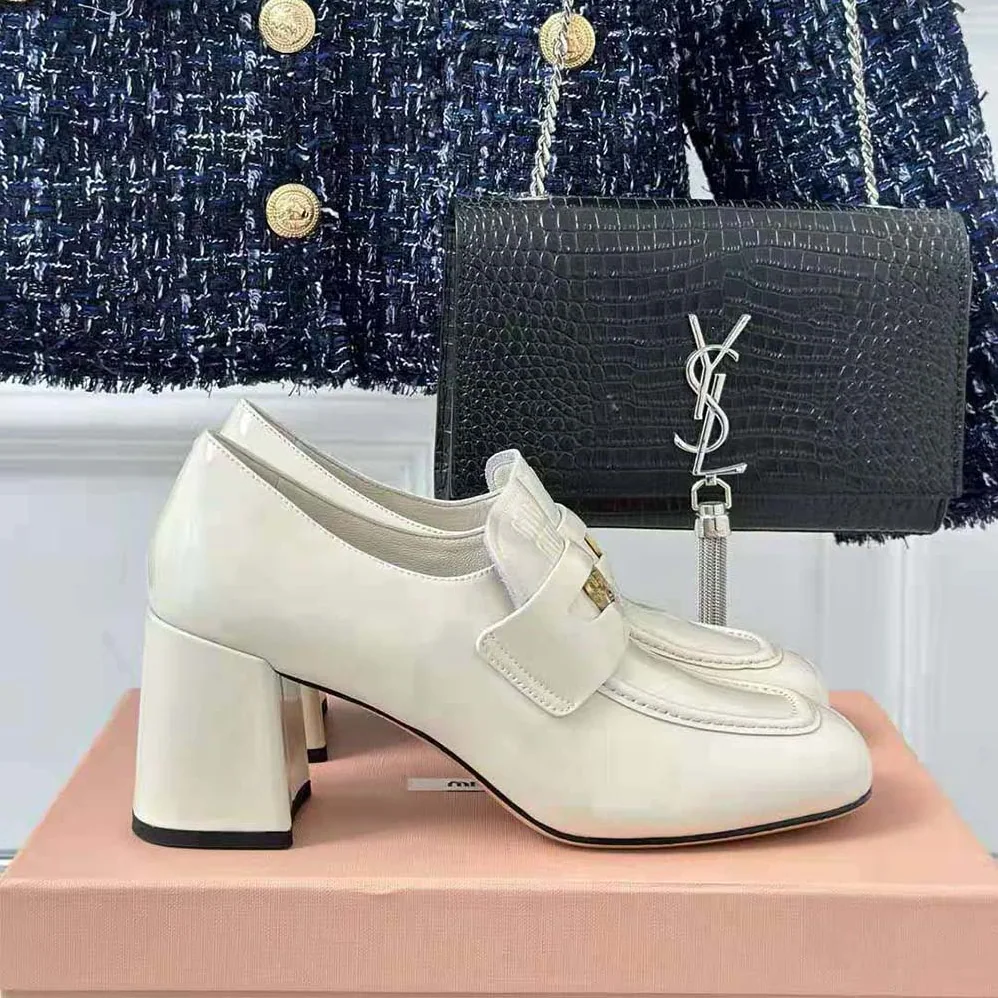 Miu Miu Patent Leather Loafers with Embossed Logo on the Tongue for Women in White Miu Miu Patent Leather Loafers with Embossed Logo on the Tongue for Women in White