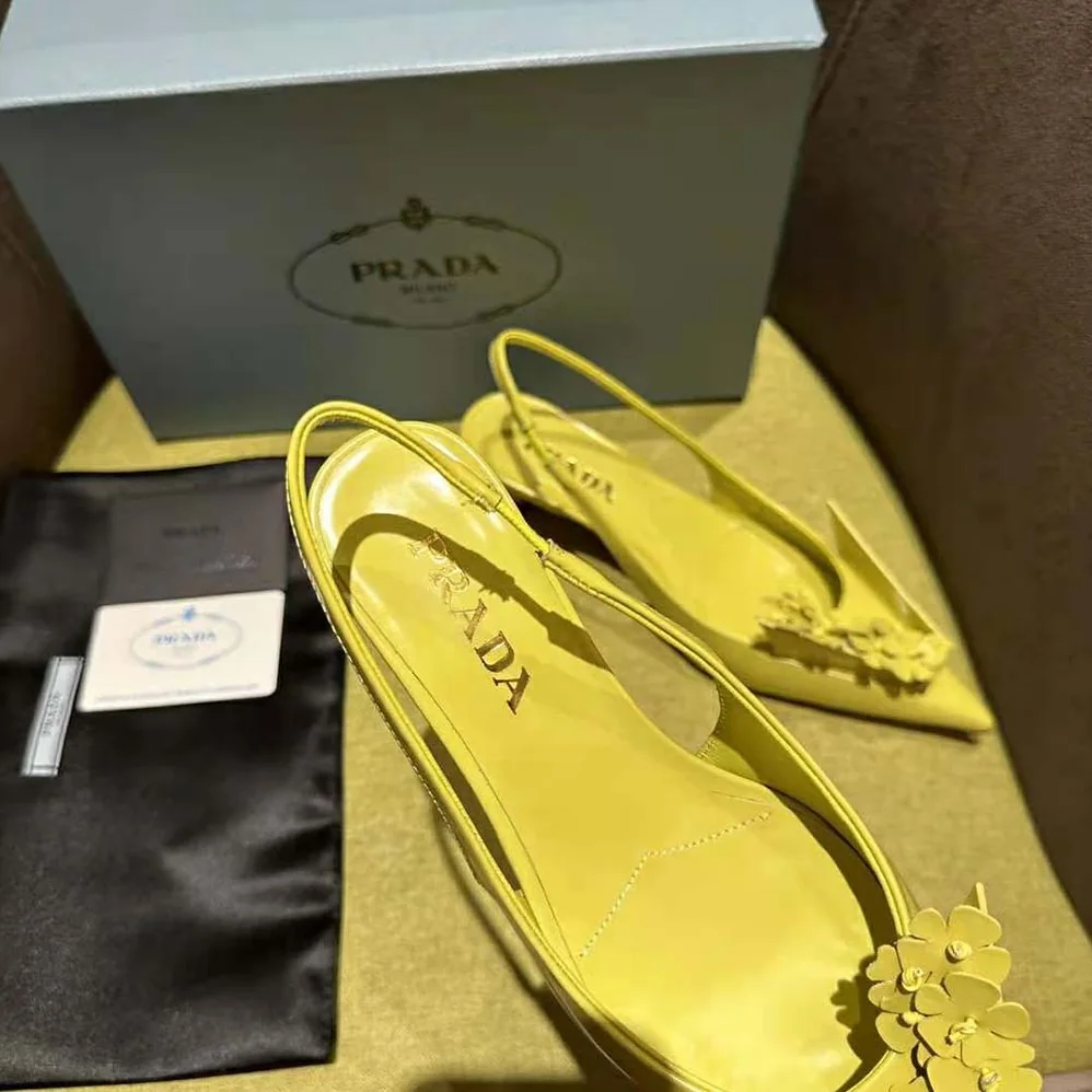 Prada Brushed Leather Slingback Pumps with Floral Appliques for Women in Yellow