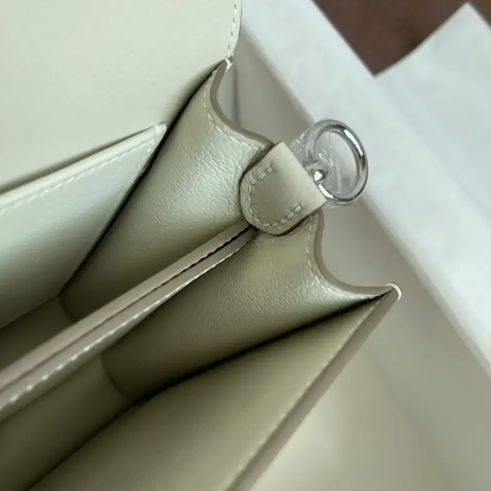 Hermes Roulis Mini Bag in Evercolor Calfskin for Women in White/Silver Hermes Roulis Mini Bag in Evercolor Calfskin for Women in White/Silver