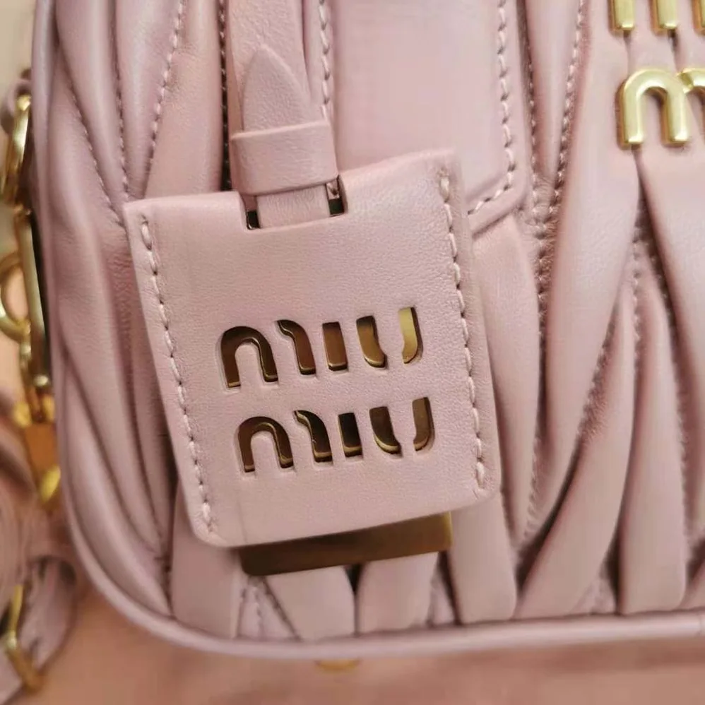 Miu Miu Matelassé Nappa Leather Top-Handle Bag for Women in Pink Miu Miu Matelassé Nappa Leather Top-Handle Bag for Women in Pink