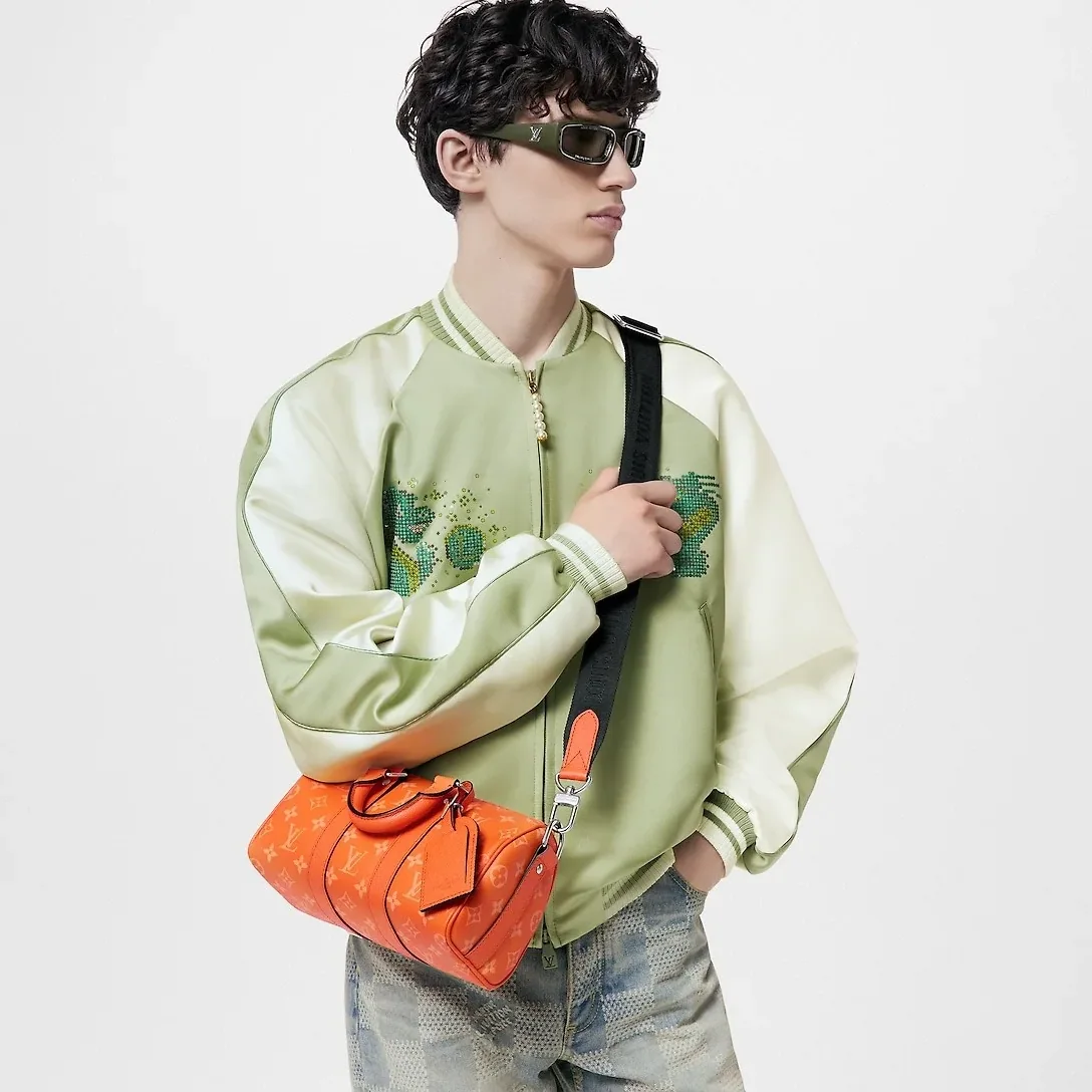 Louis Vuitton Keepall Bandouliere 25 Travel Bag in Orange Silver Hardware Louis Vuitton Keepall Bandouliere 25 Travel Bag in Orange Silver Hardware