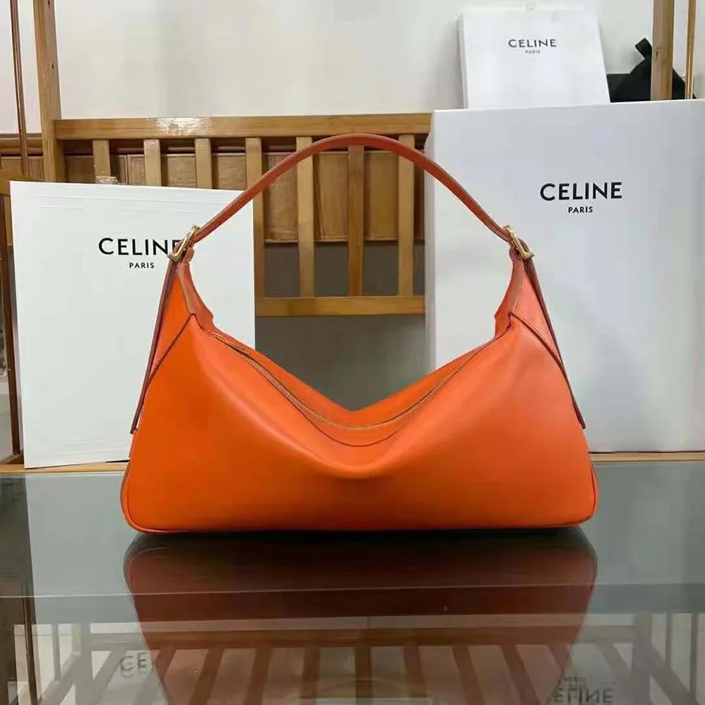 Celine Medium Romy in Supple Calfskin for Women in Orange Celine Medium Romy in Supple Calfskin for Women in Orange