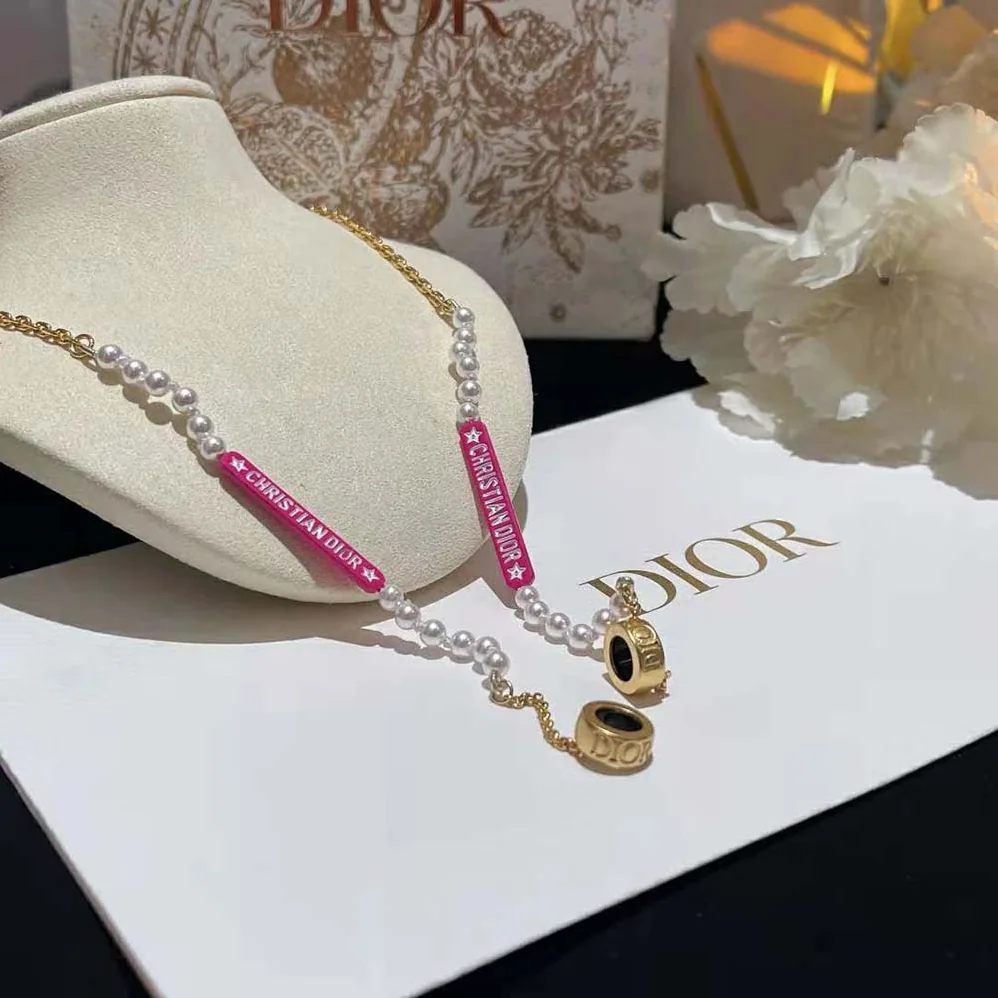Dior D-Vibe Necklace for Headphones Gold-Finish Metal and White Resin Pearls for Women Dior D-Vibe Necklace for Headphones Gold-Finish Metal and White Resin Pearls for Women