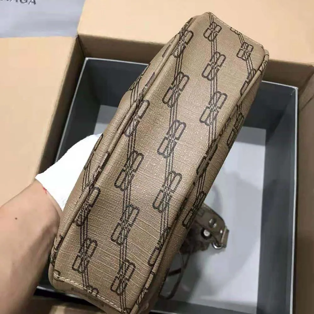 Balenciaga Le Cagole Mini Bag with Chain BB Monogram Coated Canvas in Beige for Women
