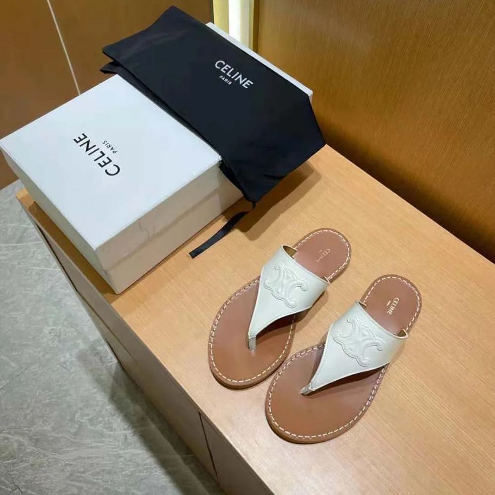 Celine Triomphe Flat Thong in Calfskin for Women in White Celine Triomphe Flat Thong in Calfskin for Women in White