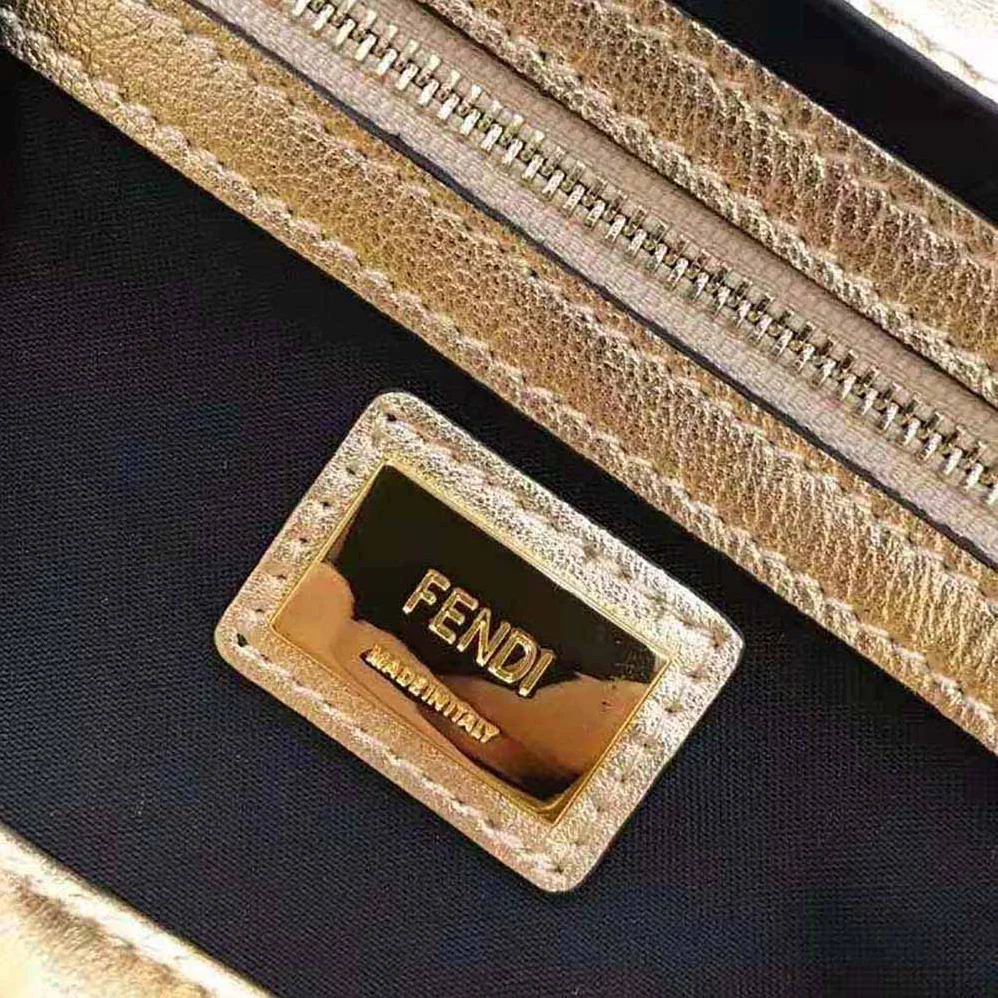 Fendi Baguette Fendi Prints On Leather Bag for Women in Gold Fendi Baguette Fendi Prints On Leather Bag for Women in Gold