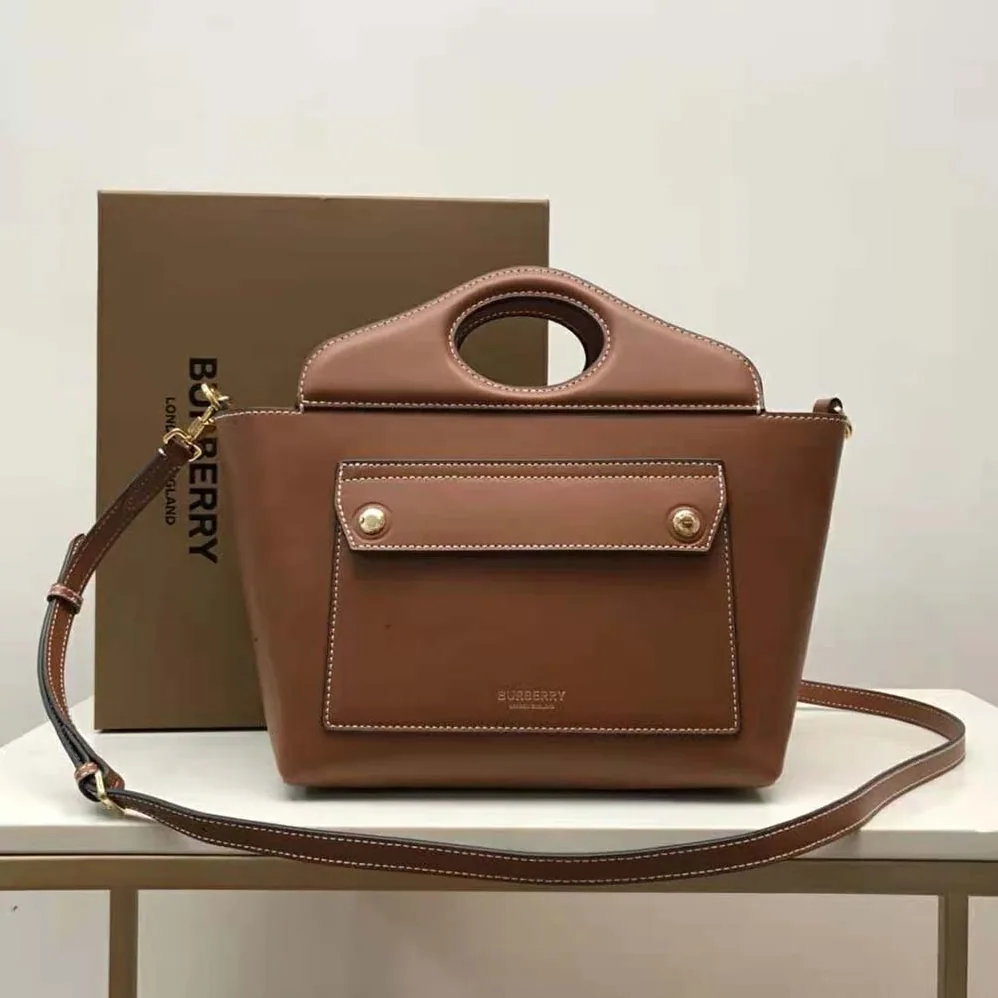 Burberry Mini Leather Soft Pocket Tote for Women in Brown Burberry Mini Leather Soft Pocket Tote for Women in Brown