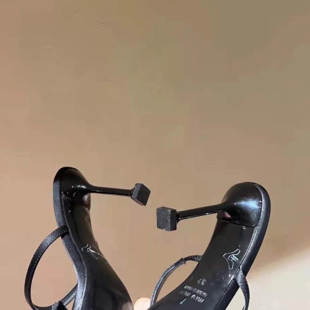 Miu Miu Satin Bow Sandals in 85 mm Heel Height for Women in Black