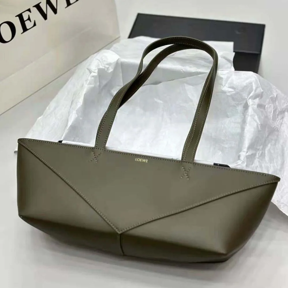Loewe Cropped Puzzle Fold Bag in Shiny Calfskin for Women in Green Loewe Cropped Puzzle Fold Bag in Shiny Calfskin for Women in Green