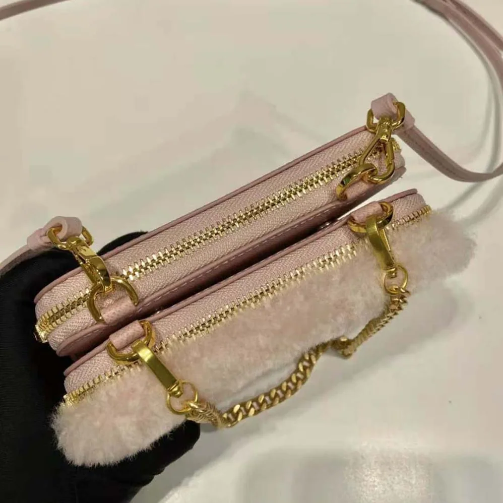 Prada Shearling and Saffiano Leather Mini-Pouch for Women in Pink Prada Shearling and Saffiano Leather Mini-Pouch for Women in Pink
