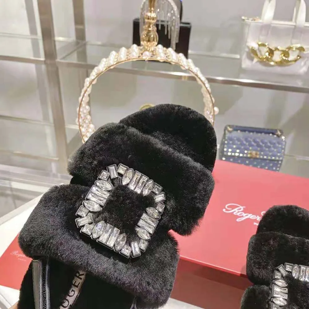 Roger Vivier Viv' Winter Fur Strass Buckle Sandals in Sheepskin for Women in Black Roger Vivier Viv' Winter Fur Strass Buckle Sandals in Sheepskin for Women in Black
