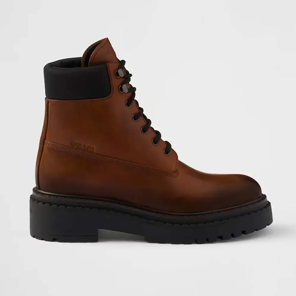Prada Leather and Re-Nylon booties for Unisex in Ebony