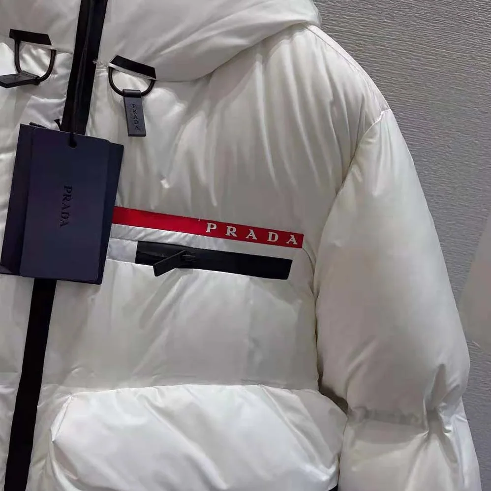 Prada Light Polyester Puffer Jacket for Women in White Prada Light Polyester Puffer Jacket for Women in White