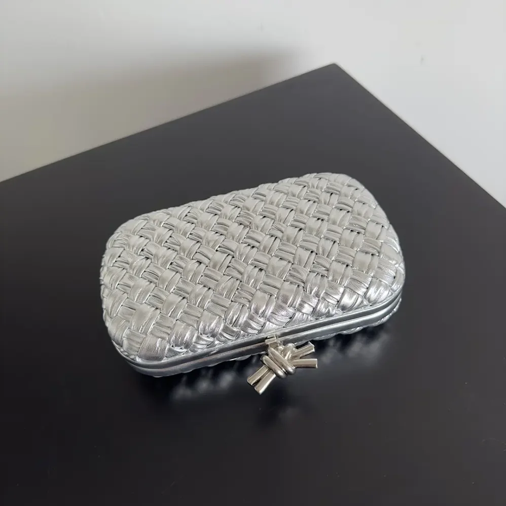 Bottega Veneta Knot Pressed Intreccio Laminated Leather Minaudiere for Women in Silver Bottega Veneta Knot Pressed Intreccio Laminated Leather Minaudiere for Women in Silver