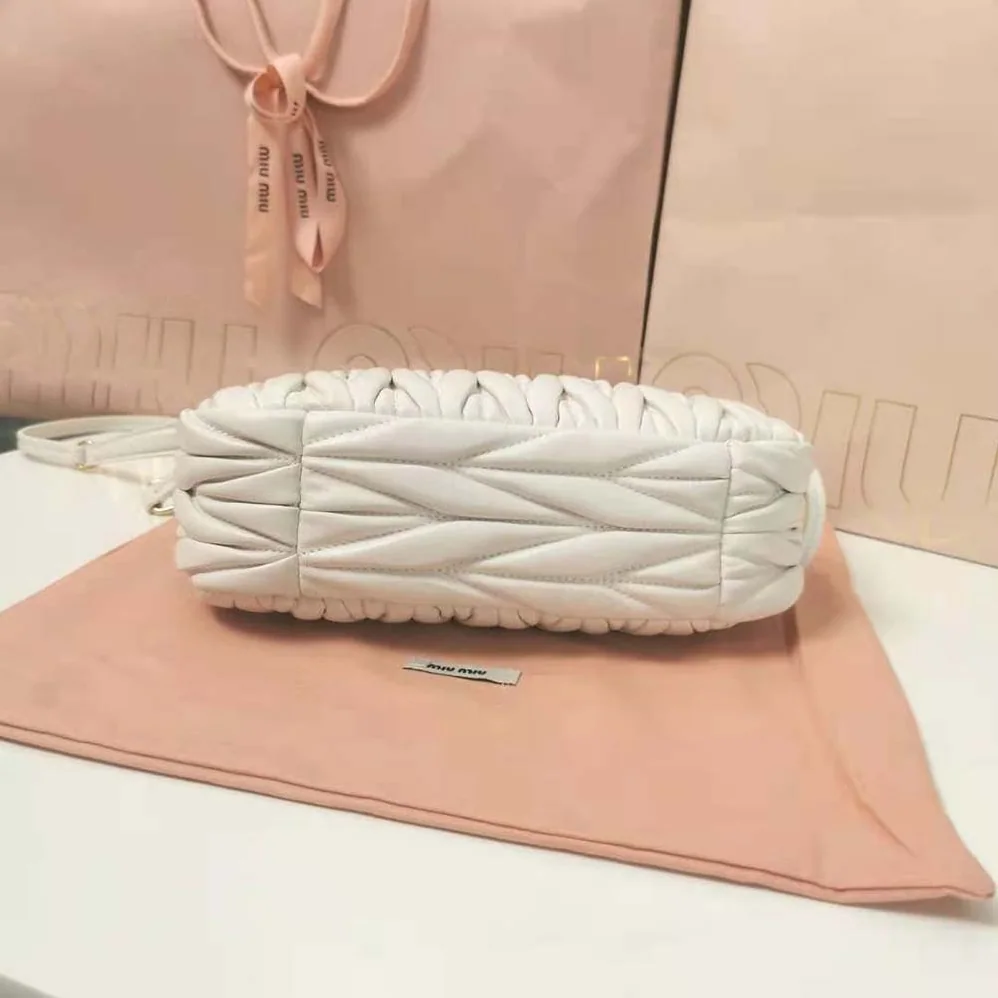 Miu Miu Wander Matelassé Nappa Leather Hobo Bag for Women in White Miu Miu Wander Matelassé Nappa Leather Hobo Bag for Women in White