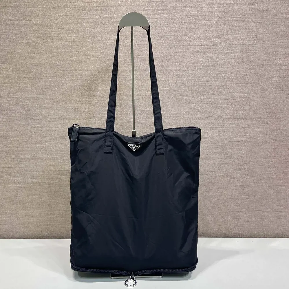 Prada Saffiano Leather Pendant With Re-Nylon Tote Bag for Women in Black Prada Saffiano Leather Pendant With Re-Nylon Tote Bag for Women in Black