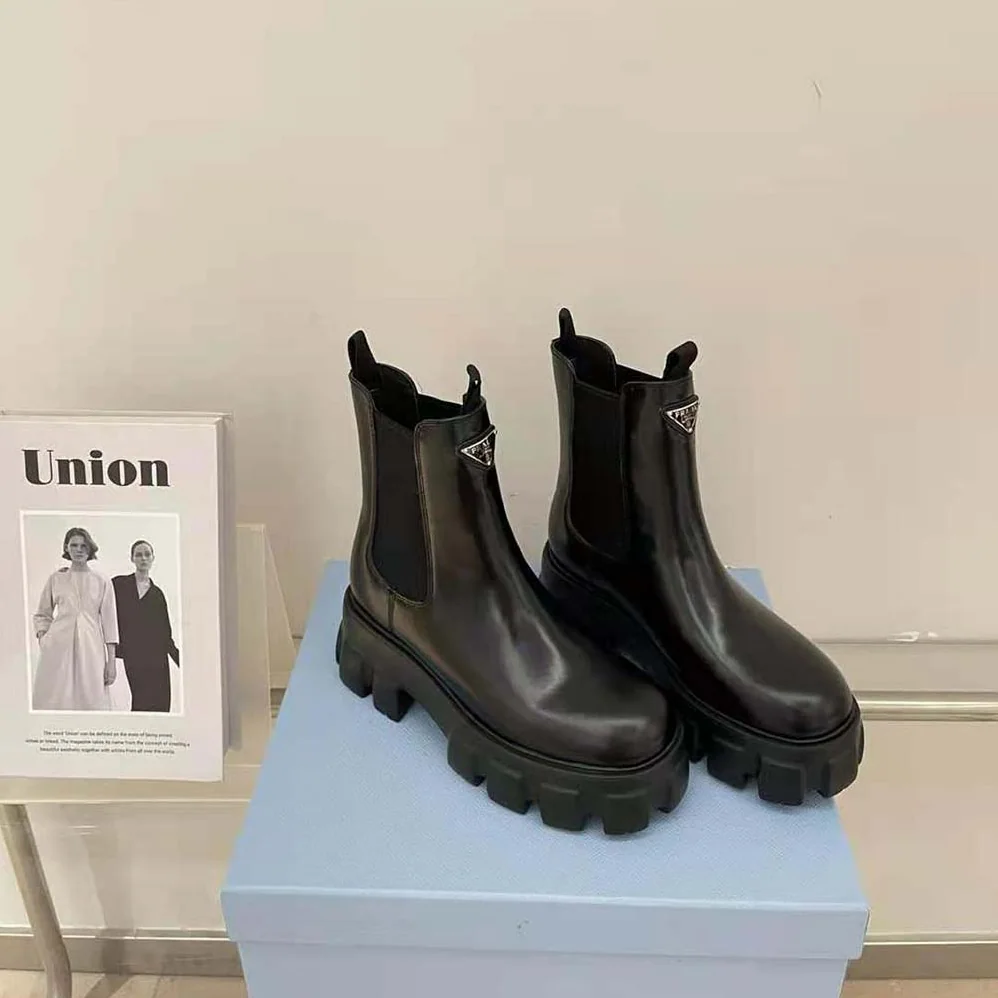 Prada Monolith Brushed Leather Booties for Women in Black