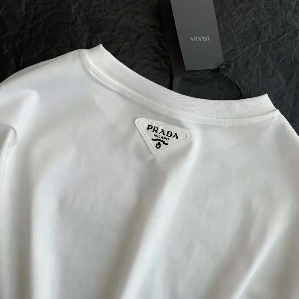 Prada Cropped Printed Jersey T-Shirt for Women in White Prada Cropped Printed Jersey T-Shirt for Women in White
