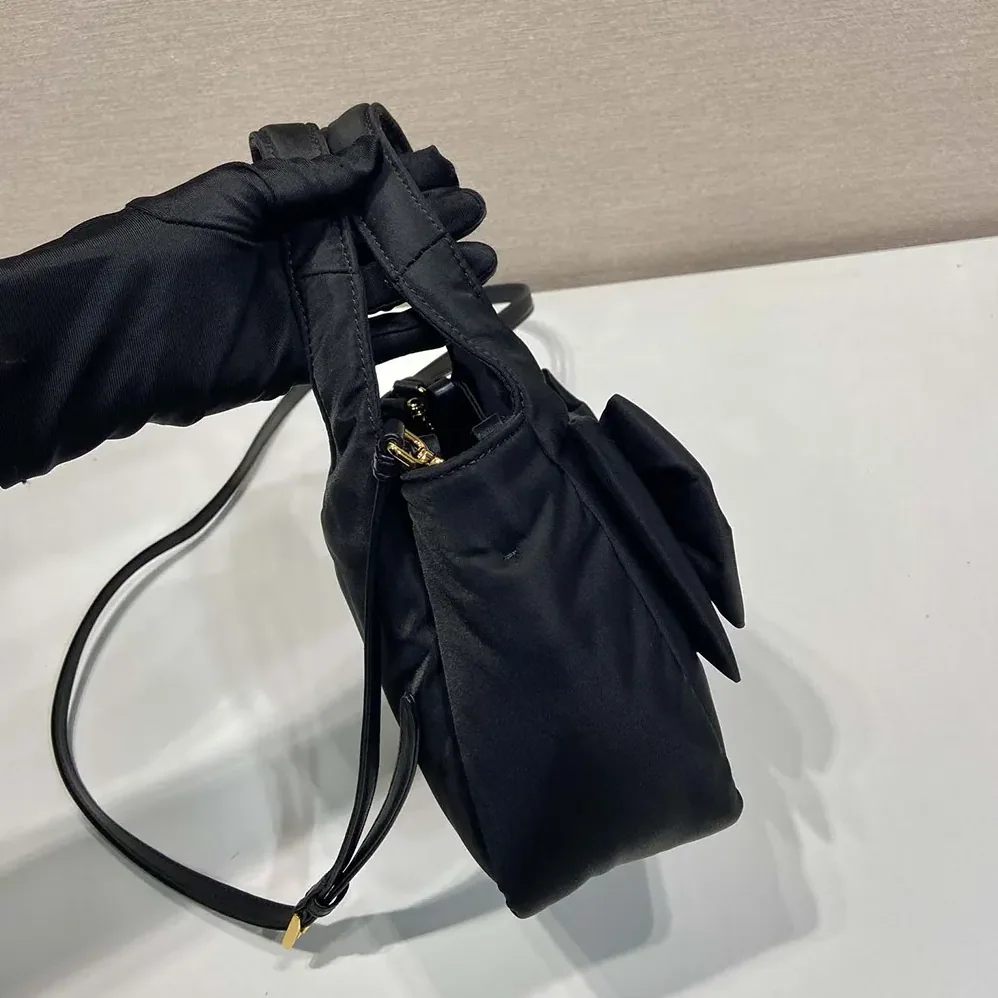 Prada Padded Re-Nylon Mini for Women in bag with Bow