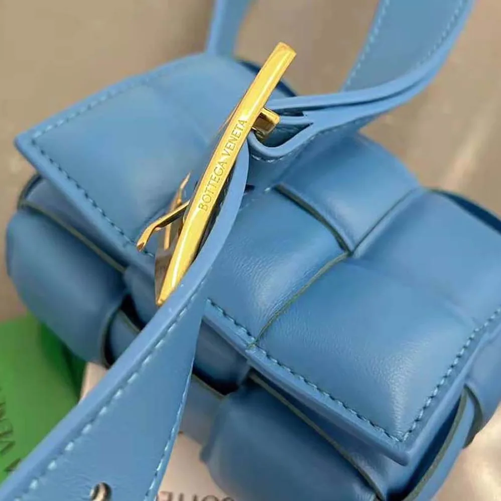 Bottega Veneta Candy Padded Cassette Mini Padded Intreccio Leather Cross-Body Bag for Women in Blue Bottega Veneta Candy Padded Cassette Mini Padded Intreccio Leather Cross-Body Bag for Women in Blue