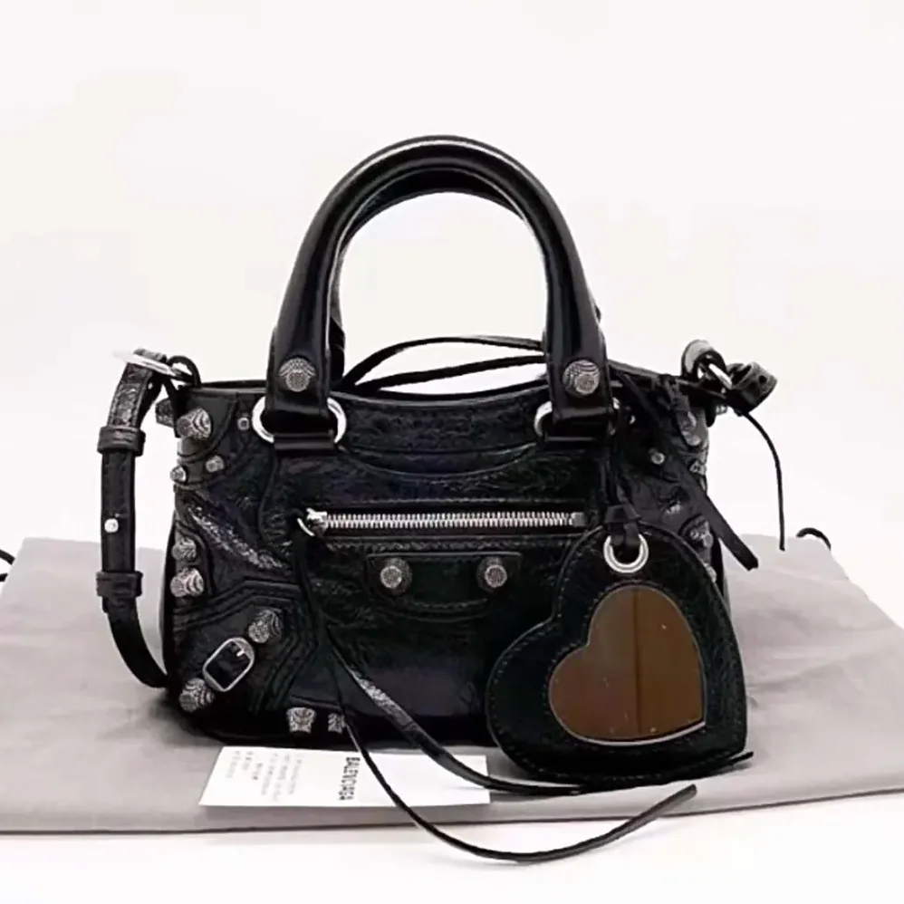 Balenciaga Neo Cagole XS Handbag in Black Arena Lambskin for Women